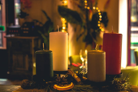 a group of candles sitting on top of a table
